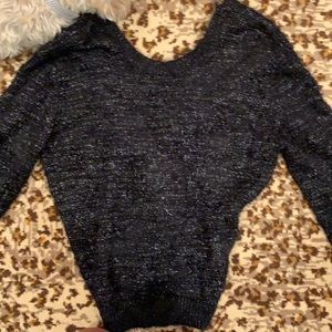 Shimmery sweater with fun back